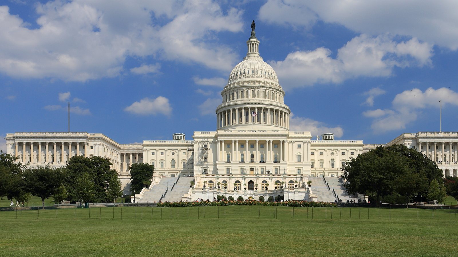 The United States Capitol west front with lawn and steps