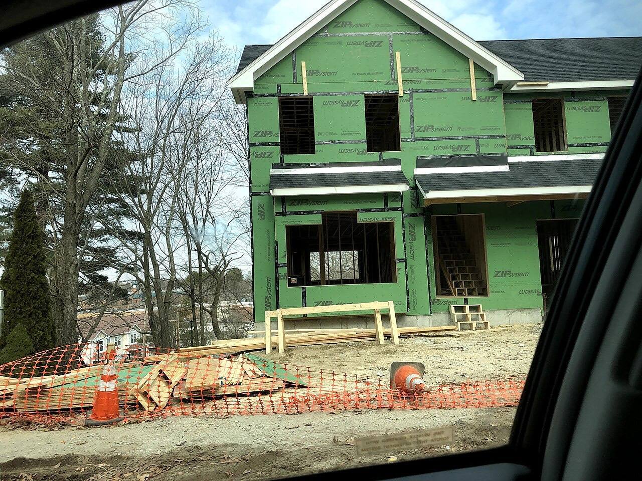 New construction framing and sheathing underway on a new construction on Gayland Rd, in Needham MA. An existing smaller house was torn down to make way for this