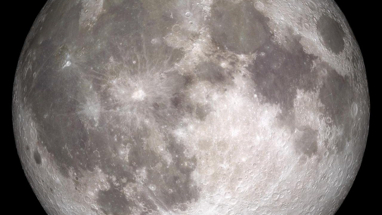 The full moon photographed against black space